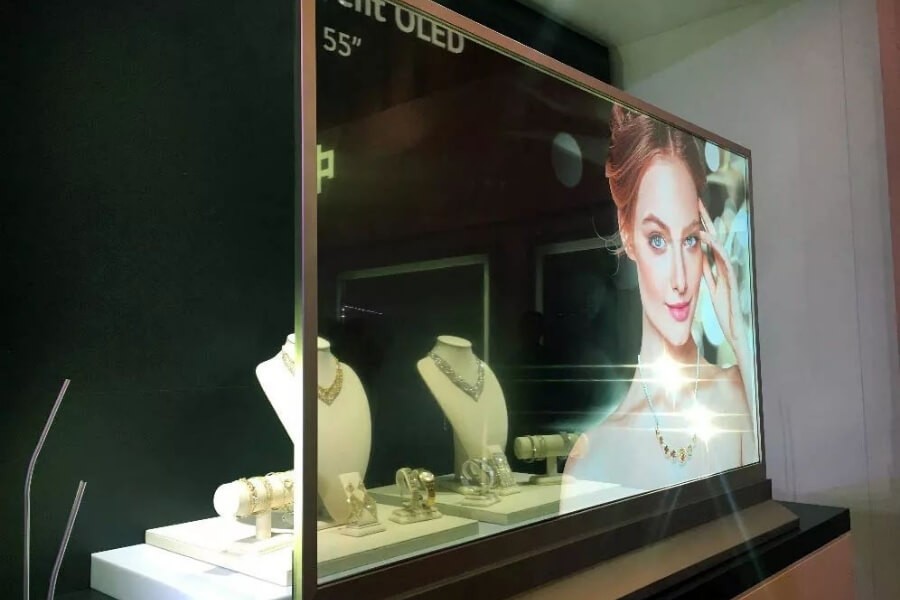 Transparent OLED displays used in retail environments, transforming product showcases and windows into interactive media.